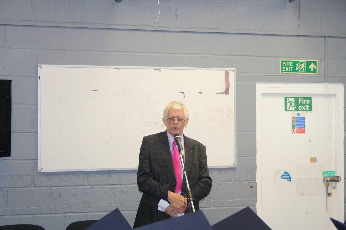 A speaker addressing learners at a Keyznow graduation ceremony